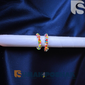 Multicolored bead kadha for Laddu Gopal Ji displayed on a white roll with a dark blue velvet background – handcrafted devotional jewelry from sumanposhak.com.