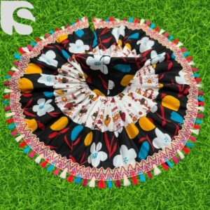Colorful cotton Laddu Gopal dress with tribal and floral prints in black and white.